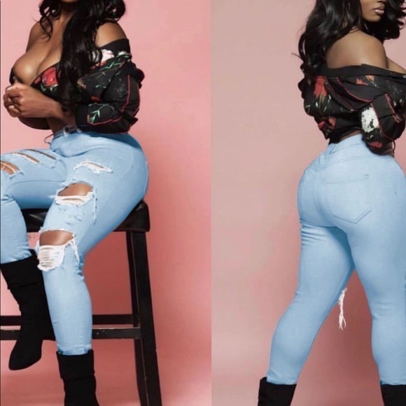 Ripped light blue jeans - Picture 3 of 3